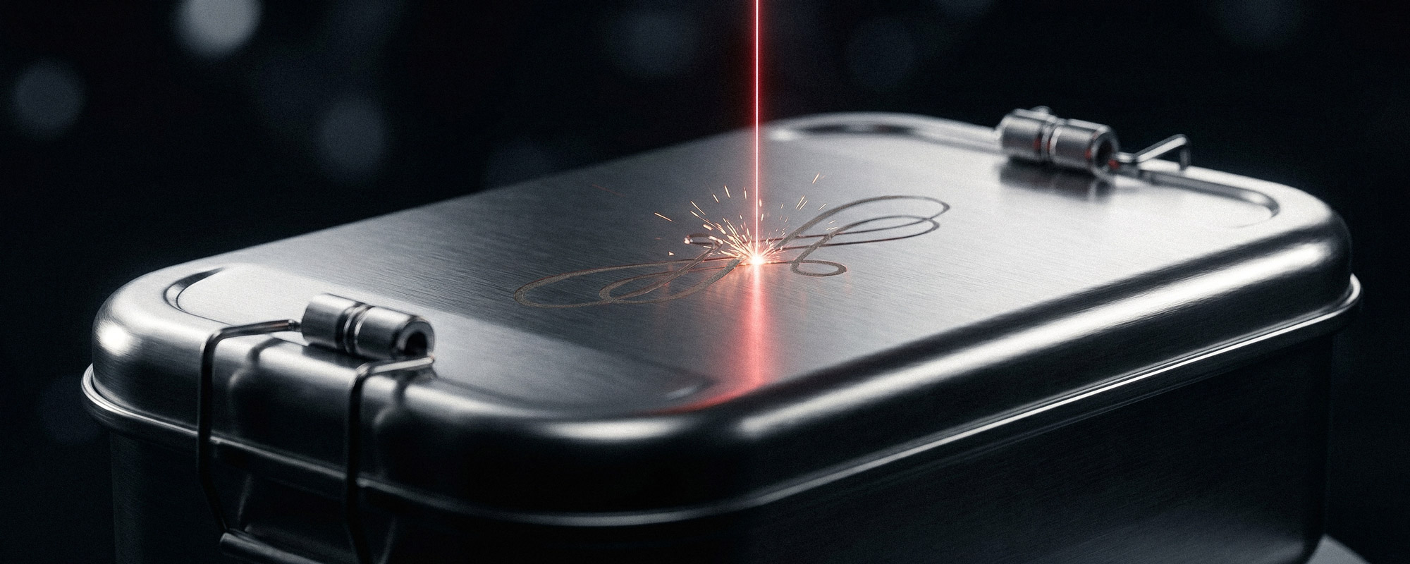 Lasergravur mit dekorativem Muster auf dem Deckel einer Metalldose mit gebürsteter Oberfläche.