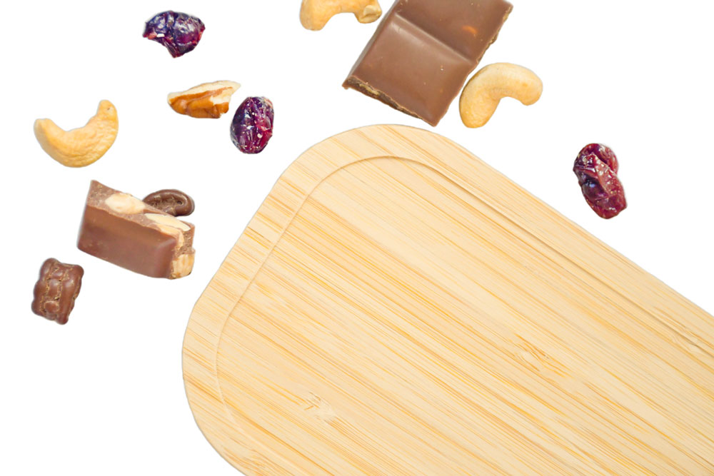 Bambusdeckel für Lunchbox, dekoriert mit Nüssen, Schokolade und Trockenfrüchten – umweltfreundlicher Ersatzdeckel